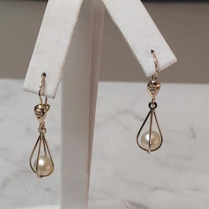 14kt Yellow Gold Lady's 6mm Cultured Pearl Dangle/Drop Earrings.