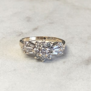 14kt Yellow Gold Lady&#39;s Diamond Cluster Halo Ring at an Incredible Price.