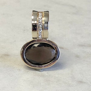14kt Yellow Gold Lady&#39;s Diamond and Smokey Quartz Gemstone Bezel Pendant at a Very Affordable Price.