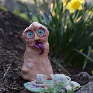 Creepy garden alien