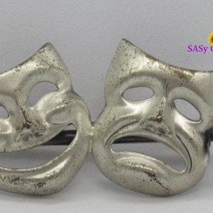 Spilla vintage in argento con tema commedia-tragedia