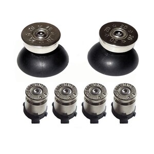May include: Set of six silver bullet-shaped controller thumbsticks for gaming consoles. Two large thumbsticks with black bases and four smaller thumbsticks with black bases.