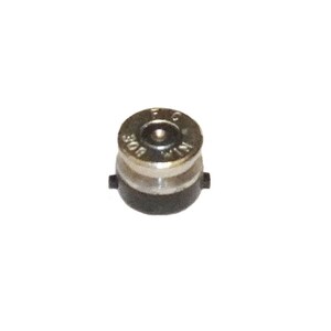May include: A small, metallic component with a cylindrical form. The top section is silver with engraved text, and the base is black. It looks like a small part, possibly for a larger device or mechanism.