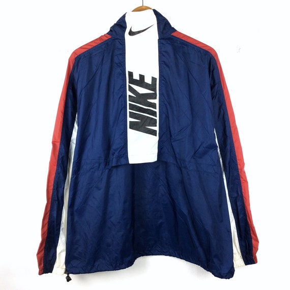 dark blue nike windbreaker