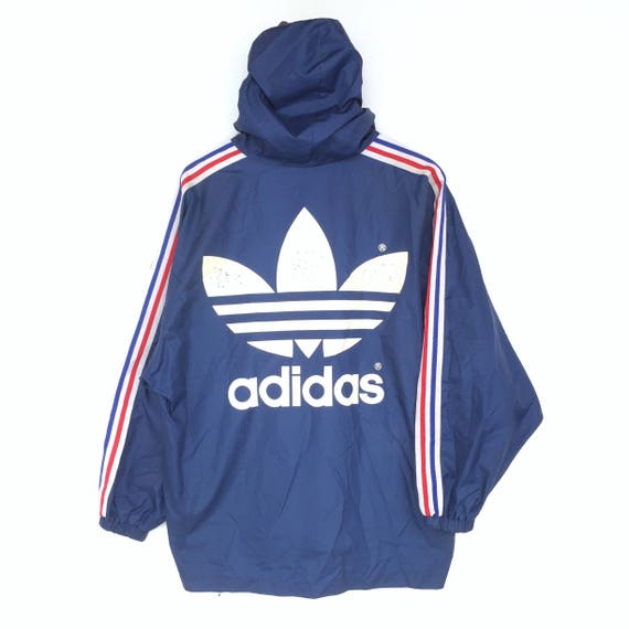 red and blue vintage adidas bomber jacket