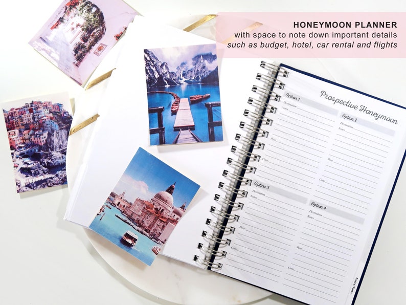 May include: A blue and white planner with a silver spiral binding. The planner is open to a page titled "Prospective Honeymoon" with sections for four different honeymoon options. The planner has space to note down important details such as budget, hotel, car rental and flights.