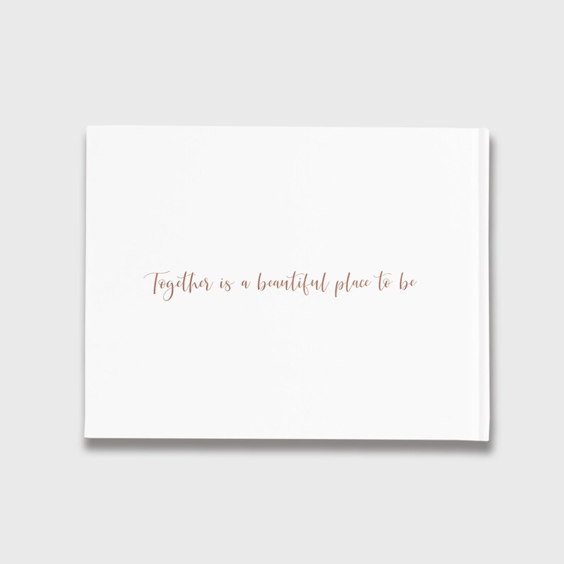 May include: White card with the text "Together is a beautiful place to be" written in cursive in a light brown color.