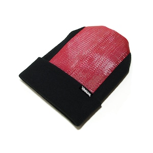 May include: A black and red beanie with a textured red panel and the word "Wander" in white lettering.