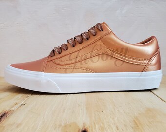 black and rose gold vans