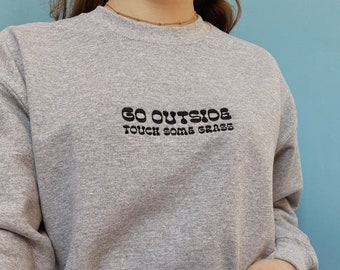 Embroidered 'Go Outside, Touch Some Grass' Crew Neck Jumper