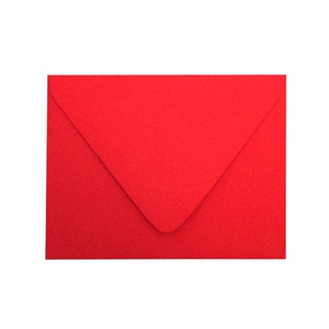 May include: A rectangular envelope in a vibrant, solid red color. The envelope features a classic pointed flap design that is folded down, covering the upper portion of the front face. The paper surface appears to have a subtle, fine texture.