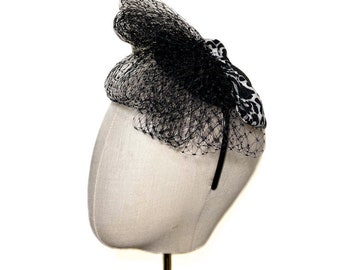 Black fascinator with leopard patterned bow and veil, headband hat, hat with bow, hat with veil, cocktail hat, leopard print