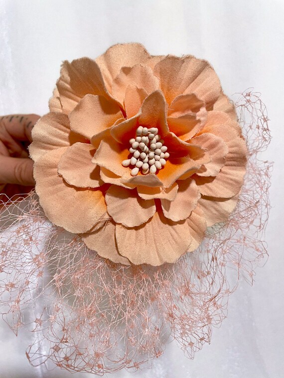 Peach Colored Fascinator With Peach Colored Flower and Veil 