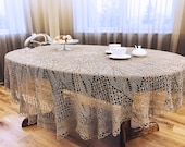 Large hand knitted crochet lace tablecloth for living room. Undyed natural linen round tablecloth. Rustic vintage dining table decoration.