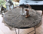Hand knitted coffee table crochet doily. Undyed natural linen lace round tablecloth. Rustic vintage dining table decoration for living room.