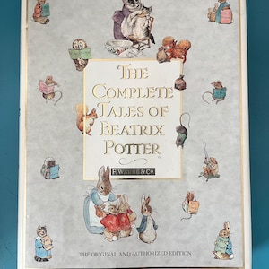 May include: A hardback edition of "The Complete Tales of Beatrix Potter" with illustrations of animal characters. The cover features the title in gold lettering, surrounded by charming drawings of rabbits, squirrels, and other creatures.
