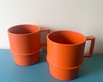 Vintage Tupperware stacking mugs in burnt orange, set of 2