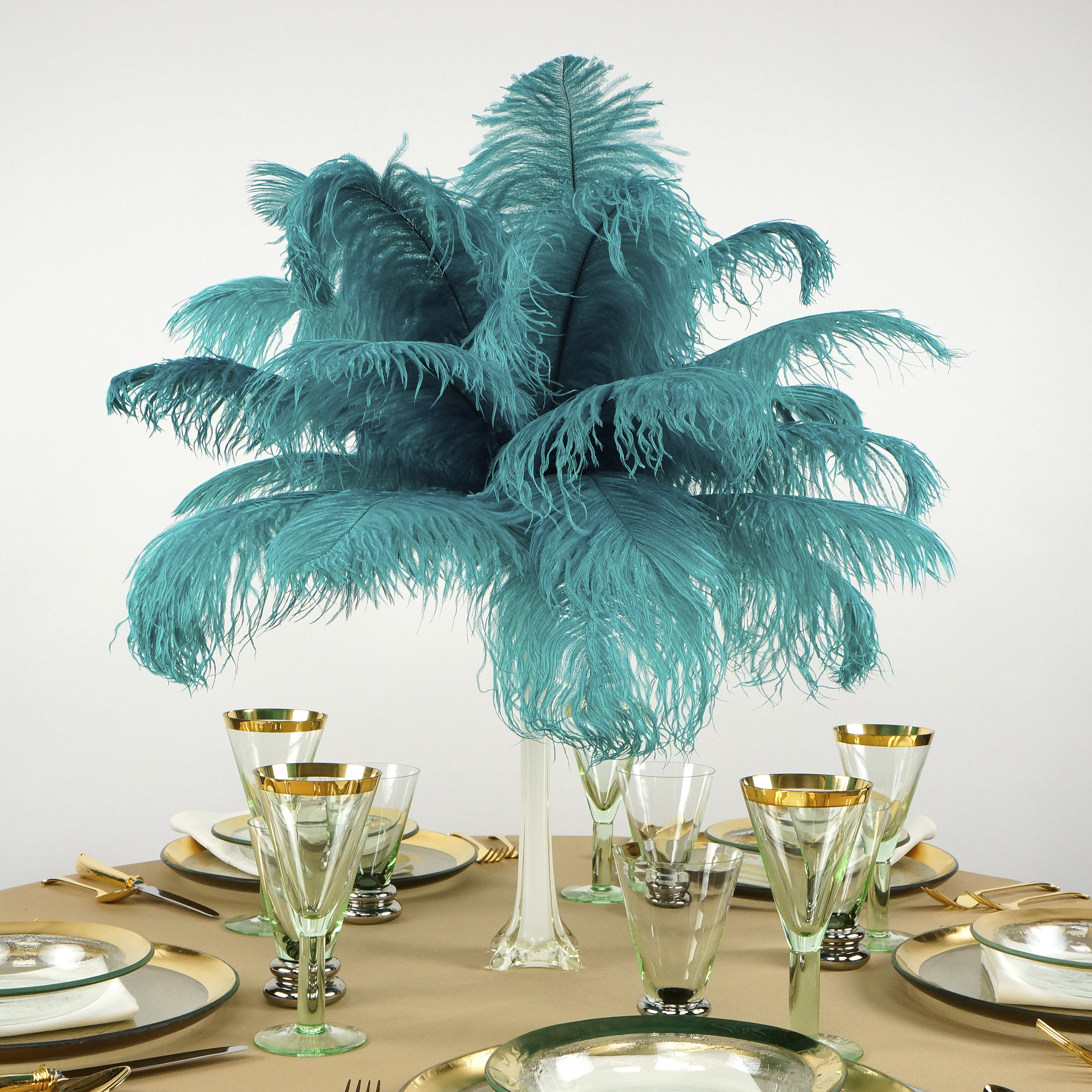 How To Make Gorgeous DIY Ostrich Feather Centerpieces (+ 7 variations)   Masquerade party decorations, Feather centerpieces, Ostrich feather  centerpieces