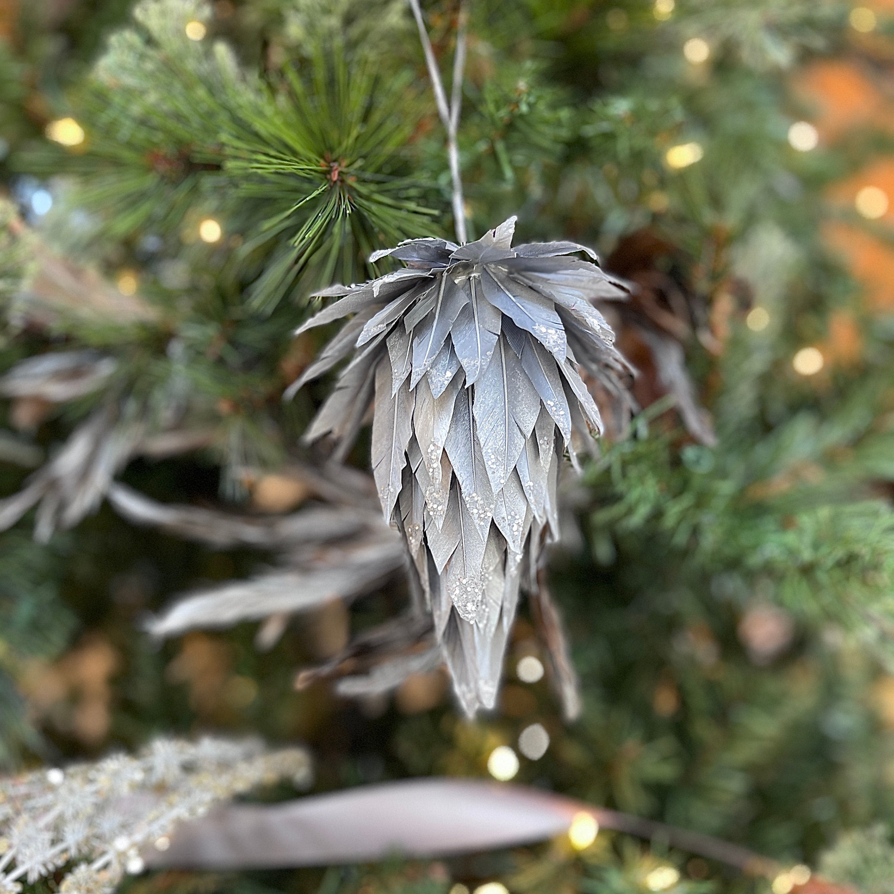 Silver Decorative Pine Cone Feather Ornament With Glitter Details Christmas  Decor, Unique Holiday Decorative Ornaments ZUCKER® -  Finland