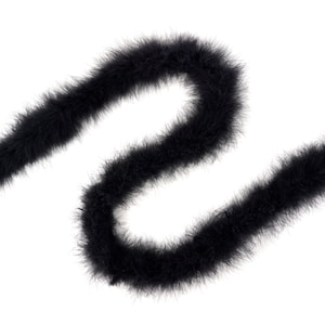 May include: A long, flexible black feather boa arranged in a curved, serpentine shape. The accessory features dense, soft, and wispy black feathers that create a textured, voluminous appearance throughout the entire length of the decorative trim.