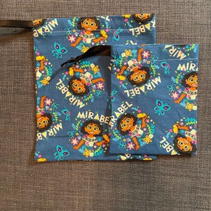 Drawstring Fabric Gift Bags blue mirabel encanto butterflies flowers