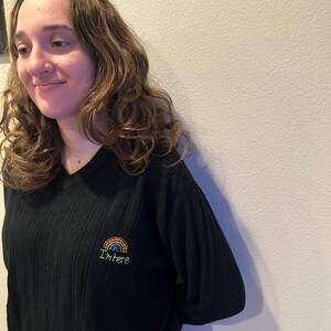 Rainbow I’m here hand embroidered black  thrifted v-neck sweater size large dockers