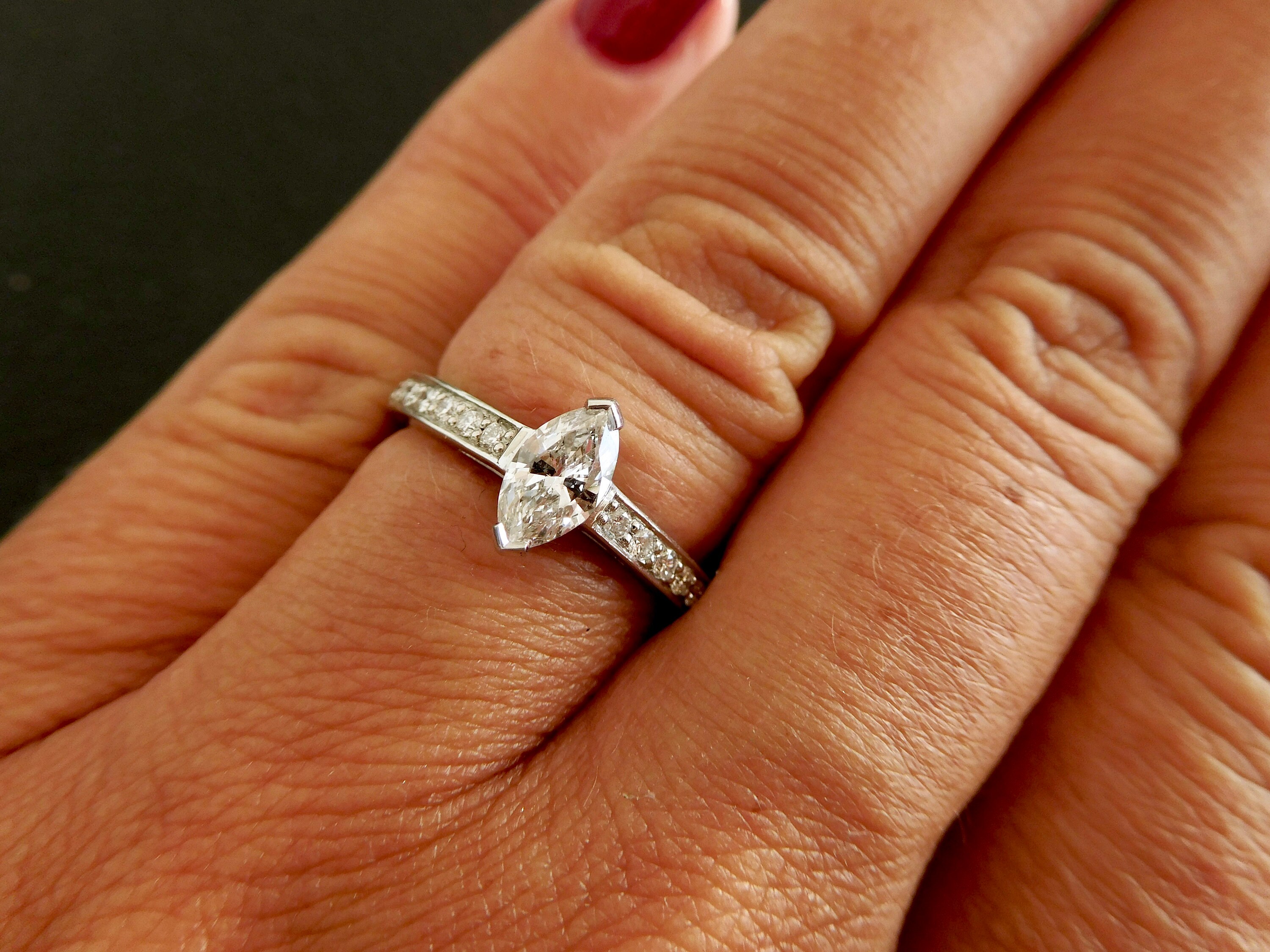 solitaire marquise engagement ring