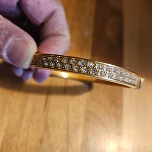 Swarovski Crystal Goldtone Hinged Bangle with Clear Crystals