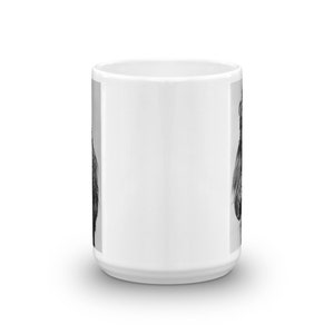 May include: White ceramic coffee mug with a black and white image of a rooster on one side.