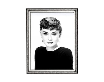 May include: Black and white framed portrait of a woman with short, wavy hair and dangling earrings. She is wearing a black top. The frame is silver with a textured design. The portrait is a classic, vintage style.