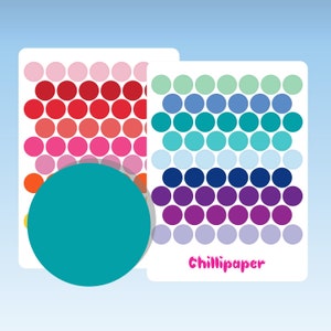 May include: Two sheets of colourful dot stickers. The first sheet has red, orange, yellow, green, blue, purple, and pink dots. The second sheet has blue, green, teal, purple, and lavender dots. The text "Chillipaper" is printed on the second sheet.