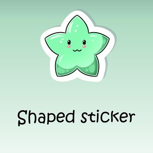May include: A green star-shaped sticker with a cute cartoon face. The sticker has a white border and is labeled "Shaped sticker".