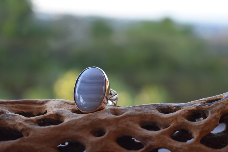 Blue Lace Agate sterling silver ring with a copper housing Blue Lace Agate sterling silver ring with a copper housing