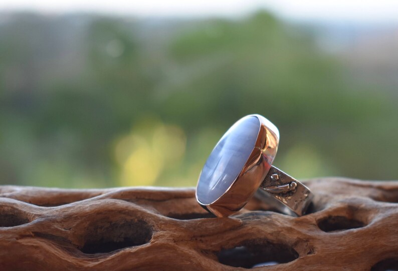 Blue Lace Agate sterling silver ring with a copper housing Blue Lace Agate sterling silver ring with a copper housing