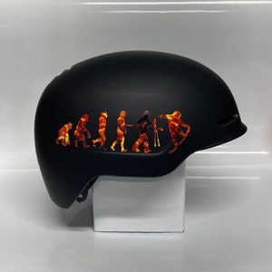 Pegatina de la evolución del snowboard con fuego