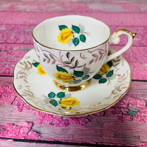 Queen Anne Yellow Roses Tea Cup and Saucer Fine Bone China Vintage England Made (0178)