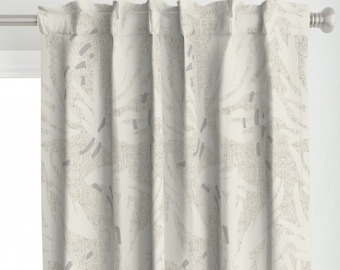 May include: White curtains with a gray abstract floral pattern. The curtains are hung on a silver curtain rod.