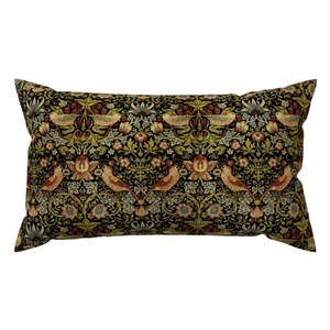 May include: Rectangular cushion with a detailed floral and bird pattern. The design features birds, flowers, and foliage in shades of red, yellow, green, and cream against a black background. A decorative home accent.