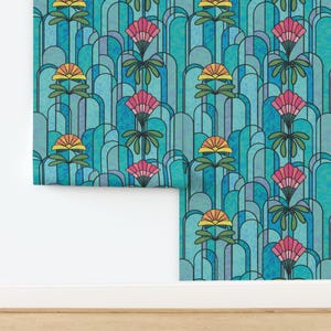 May include: A roll of wallpaper featuring a repeating pattern of stylized flowers and arch shapes in shades of teal, blue, pink, yellow, and green. The design has a stained-glass effect with black outlines, creating a vintage aesthetic.