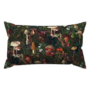 May include: A dark green cushion featuring a repeating pattern of colourful mushrooms and foliage. The mushrooms are in various shapes and sizes, and the foliage includes leaves, berries, and vines.
