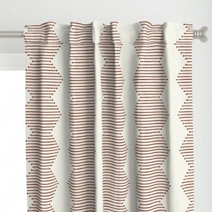 May include: White curtains with a brown geometric pattern. The pattern is made up of thin horizontal lines and small circles.