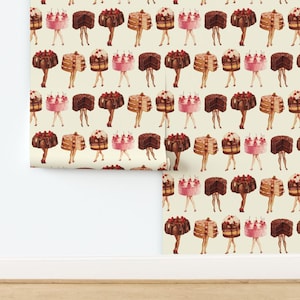 May include: A seamless pattern featuring a repeating design of various cakes with legs. The cakes are decorated with cherries, frosting, and candles. The background is a light cream color.