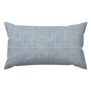 May include: A light blue rectangular pillow with a subtle woven texture.