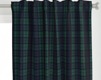 May include: A pair of dark green and black plaid curtains with a subtle sheen. The curtains are made of a soft, woven fabric and have a classic plaid pattern.