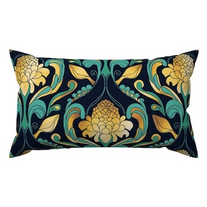 May include: A rectangular pillow with a navy blue background and a repeating pattern of gold and teal stylized flowers. The flowers have a pineapple-like shape.