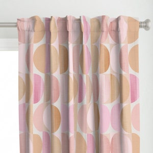 May include: Pink and orange geometric pattern curtain panel with a repeating pattern of circles and semi-circles.