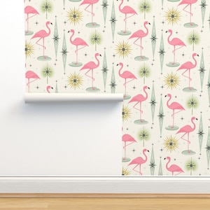 May include: A white background with a repeating pattern of pink flamingos, green palm trees, and gold stars. The flamingos are standing on a light blue circle.