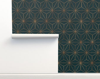 May include: Teal blue wallpaper with a geometric pattern of gold stars. The wallpaper is rolled up and partially unrolled, showing the pattern.