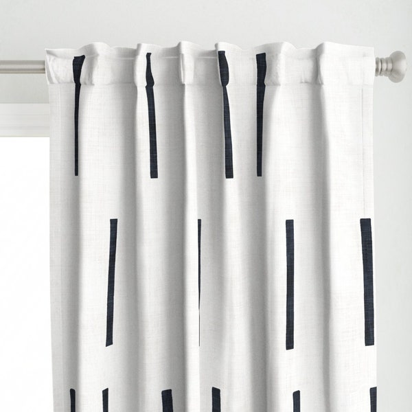 May include: White curtains with a black and white geometric pattern of vertical lines. The lines are thick and evenly spaced.