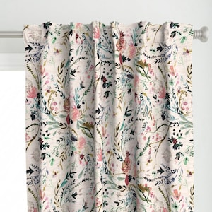 May include: A white curtain with a floral pattern in shades of pink, blue, green, and black. The floral pattern features a variety of flowers and leaves.